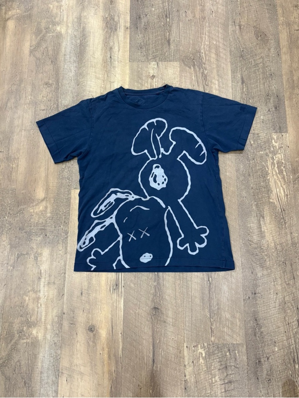 Uniqlo x KAWS Navy Blue Short Sleeve Tee with Light Gray Peanuts Graphic
